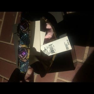 Brand new, new used swarovski crystals on outside of clutch